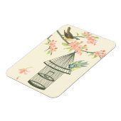 Kleine vogels op een bijkantoor en op een vogelkoo magneet (Linkerzijde)