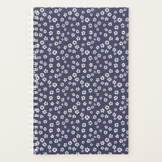 Kleine witte bloemen op een blauwe planner (Voorkant)