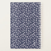 Kleine witte bloemen op een blauwe planner (Achterkant)