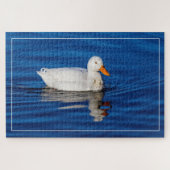 Kleine witte eend in rimpelwater legpuzzel (Horizontaal)