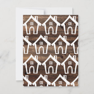 Kleine witte huizen op bruine houten verhuis kaart