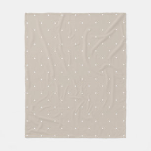 Kleine witte polka stippen op koele beige of greig fleece deken