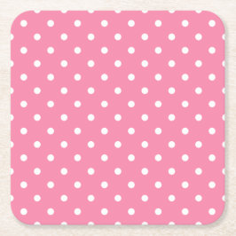 Kleine witte pooldots op opgerolde roze kartonnen onderzetters