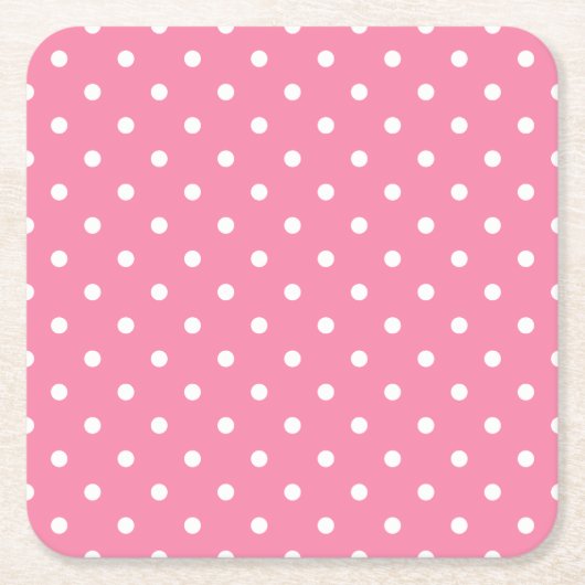 Kleine witte pooldots op opgerolde roze kartonnen onderzetters (Voorkant)