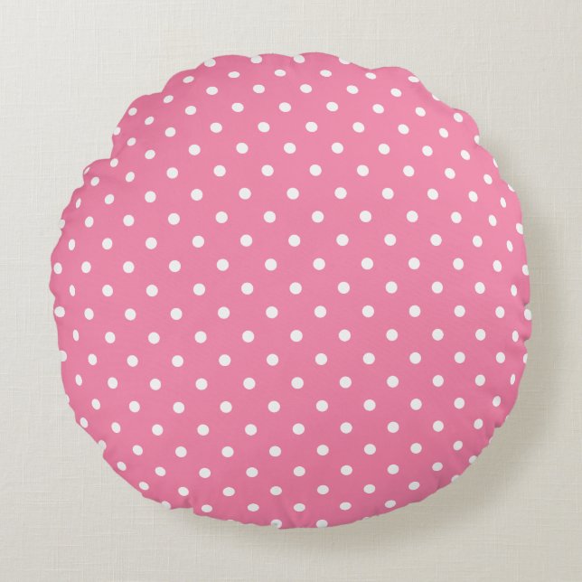 Kleine witte pooldots op opgerolde roze rond kussen (Voorkant)