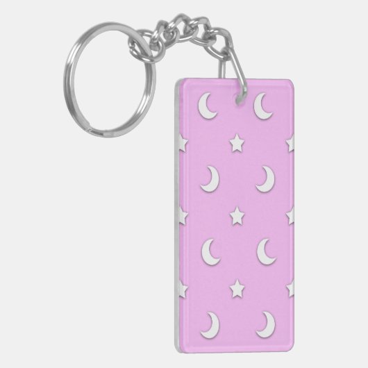 Kleine witte sterren en moons op roze sleutelhanger (Voorkant Links)
