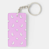 Kleine witte sterren en moons op roze sleutelhanger (achterkant)