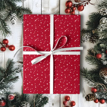 Kleine witte sterren op rode kerst