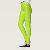 Kleine witte stippen op limoengroene leggings (Links)