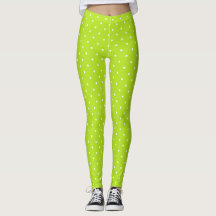 Kleine witte stippen op limoengroene leggings