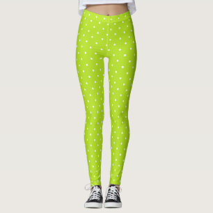Kleine witte stippen op limoengroene leggings