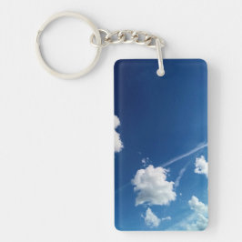 Kleine wolken in het licht sleutelhanger