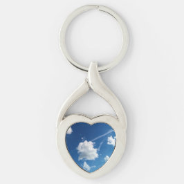 Kleine wolken in het licht sleutelhanger