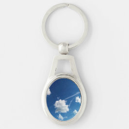 Kleine wolken in het licht sleutelhanger