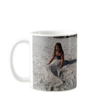 kleine zeemeermin op strand van bbillips