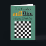 Kleinzoon - Happy Birthday - Schaakstukken en bord Kaart<br><div class="desc">Een opvallend ontwerp van schaakstukken in zwart/goud,  en bord in zwart-wit op een groene achtergrond voor de verjaardag van je kleinzoon met een liefdevol innerlijk vers dat zijn hart zal raken. ©2015- SmudgeArt / Madeline M Allen</div>