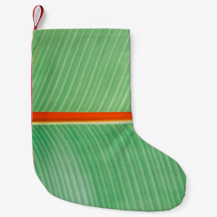 Klepfoto van groen blad kleine kerstsok