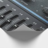 Kleurafbeelding van vele knoppen in een geluidsopn cadeaupapier (Hoek)