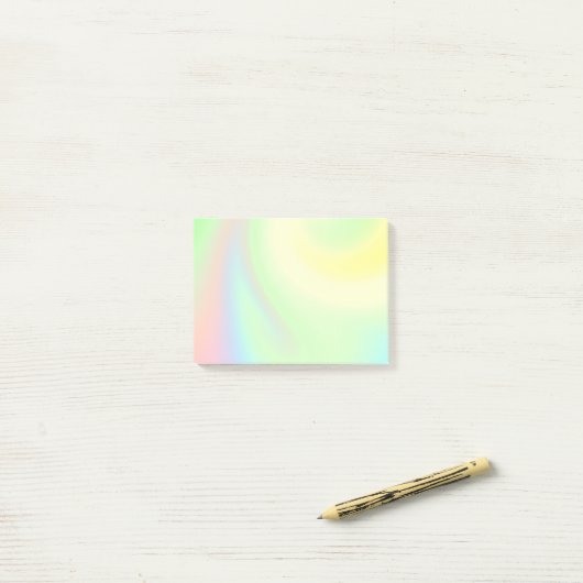 Kleurenregenboog van pasta post-it® notes (Op bureau)