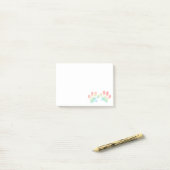 Kleurenregenboogdog plakken post-it® notes (Op bureau)