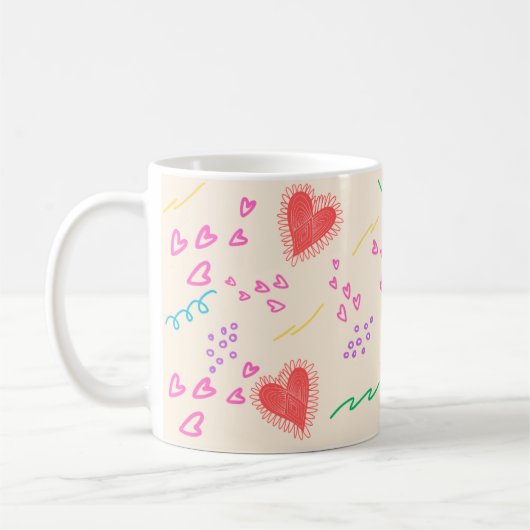 Kleurig hartenpatroon koffiemok (Links)