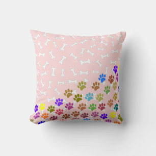 Kleurige puppy pootafdrukken en botten Licht roze Kussen