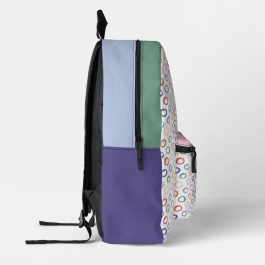 kleurrijk bedrukte rugzak (Links)