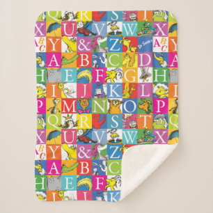 Kleurrijk blokletterpatroon van Dr. Seuss's ABC Sherpa Deken