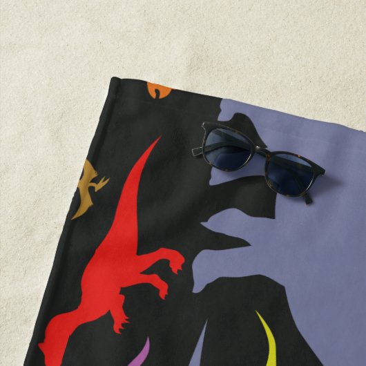 Kleurrijk dinosauruspatroon (donker) strandlaken (In situ)