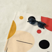 Kleurrijk geometrisch patroon uit het midden van d strandlaken (In situ)