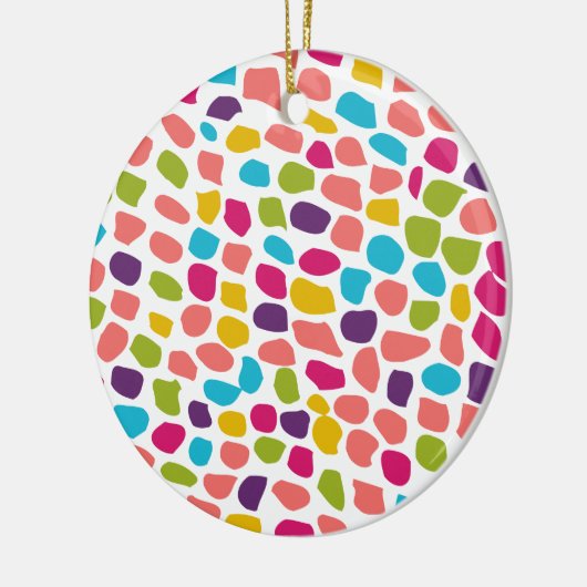 kleurrijk gepatterd keramisch ornament (Links)
