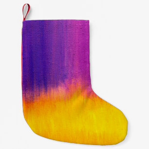 Kleurrijk geschilderd canvas als achtergrond. Kuns Kleine Kerstsok
