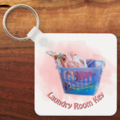 Kleurrijk gevouwen wasgoed op hanen in een blauwe  sleutelhanger (Voorkant)