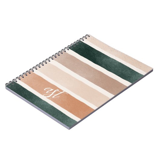 Kleurrijk initiaal van gestreepte vaartuigen met m notitieboek (Linkerzijde)