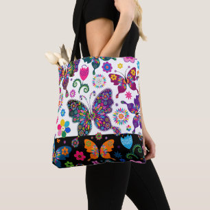 Kleurrijk patroon van bloemen en vlinders tote bag