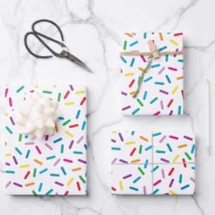 Kleurrijk regenboog sprenkels patroon inpakpapier vel