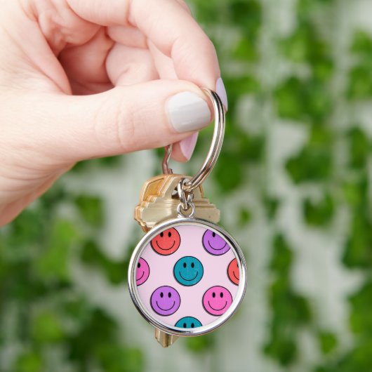 kleurrijk smiley gezicht sleutelhanger. sleutelhanger (Hand)