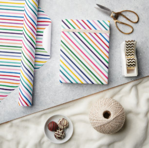 Kleurrijk streepjespatroon op knalwit cadeaupapier