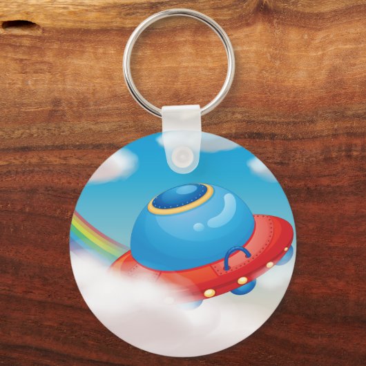 Kleurrijk UFO-ruimteschip dat door wolken vliegt Sleutelhanger (Voorkant)