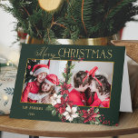 Kleurrijke 2-Foto Vrolijke Kerstpuntjes Feestdagen Kaart<br><div class="desc">Feestelijk en kleurrijk vakantieontwerp met een sjabloon met twee foto's met aangepaste gouden Merry Christmas-tekstafbeelding met een spray van traditionele kerstpoinsettia's en hulst op een groene achtergrond.</div>