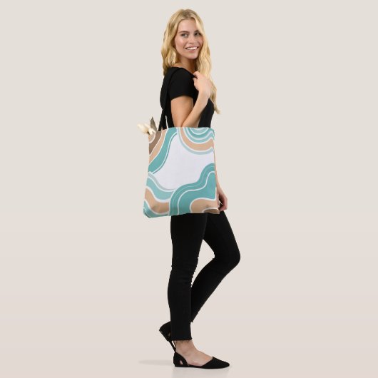 Kleurrijke abstract golvend blauw sinaasappel brui tote bag (Op model)