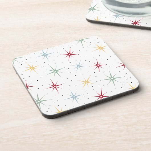 Kleurrijke atoomstartbarst uit het midden van de e bier onderzetter (Linkerzijde)