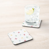 Kleurrijke atoomstartbarst uit het midden van de e bier onderzetter (Rechterzijde)