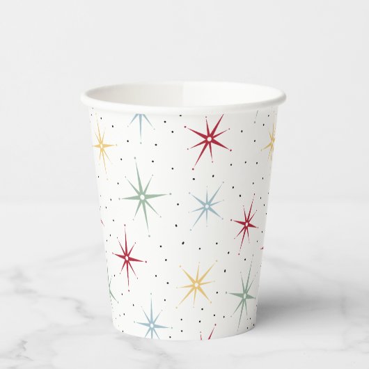 Kleurrijke atoomstartbarst uit het midden van de e papieren bekers (Links)