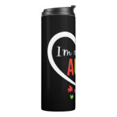 Kleurrijke autisme-bewustwording puzzelstukjes har thermosbeker (Gedraaid links)