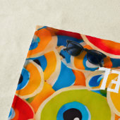 Kleurrijke badhanddoek met het boze oog (In situ)