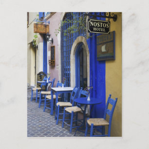 Kleurrijke blauwe deuropening en zend naar oud hot briefkaart