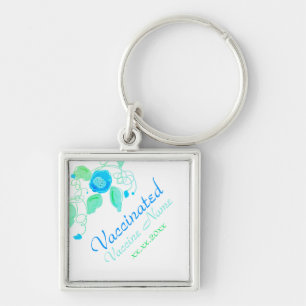 Kleurrijke bloem in blauwe ogen sleutelhanger