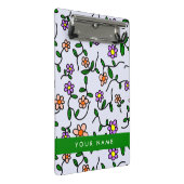 Kleurrijke bloemen, blauwe achtergrond, groen mini klembord (Schuin)