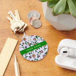 Kleurrijke bloemen, blauwe achtergrond, groen sleutelhanger